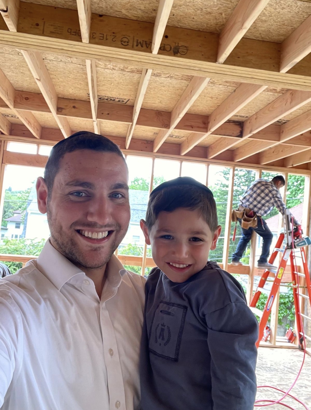 Menachem Glazer on a framed job site