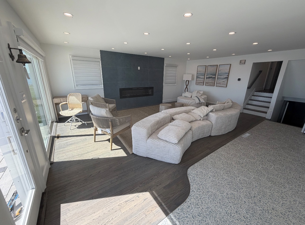 Finished living room looking toward the fireplace and stair