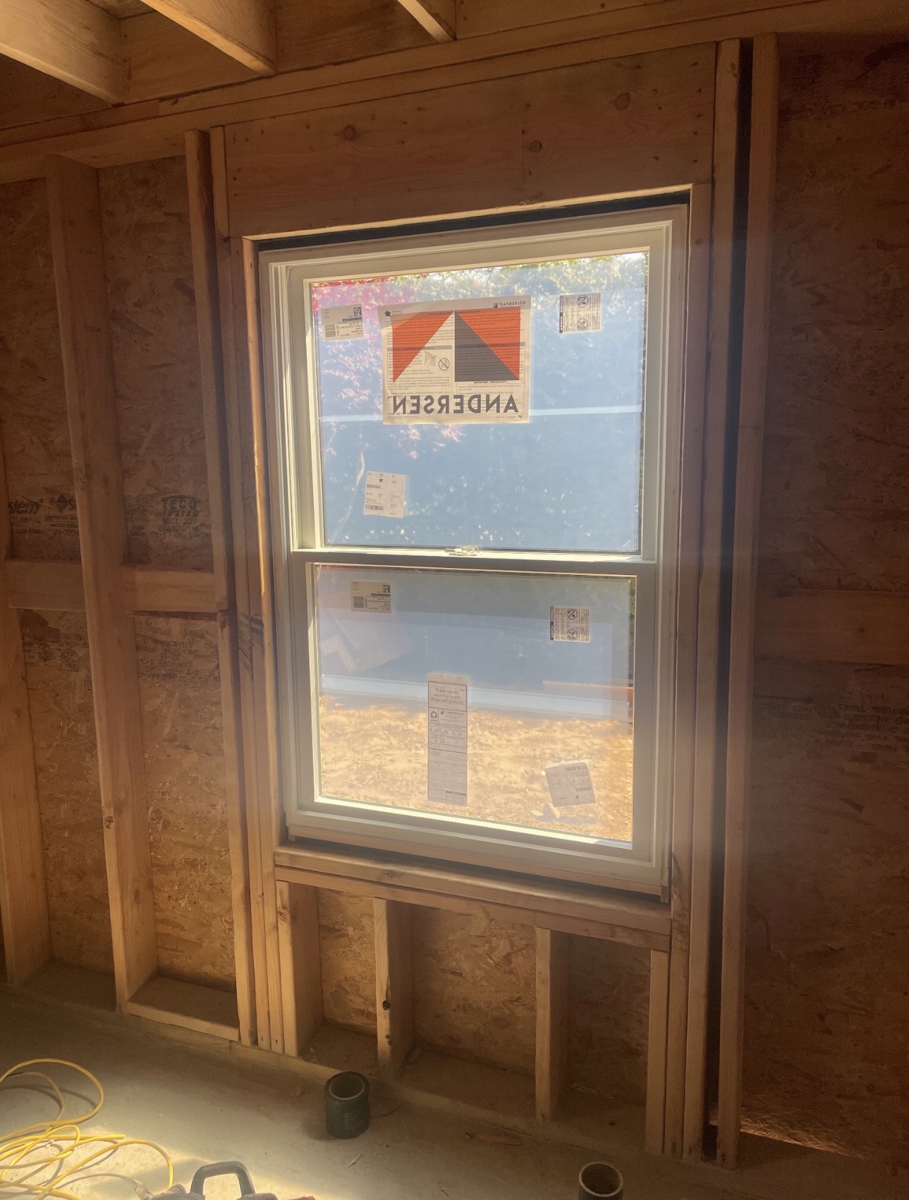 Window installed in a framed opening